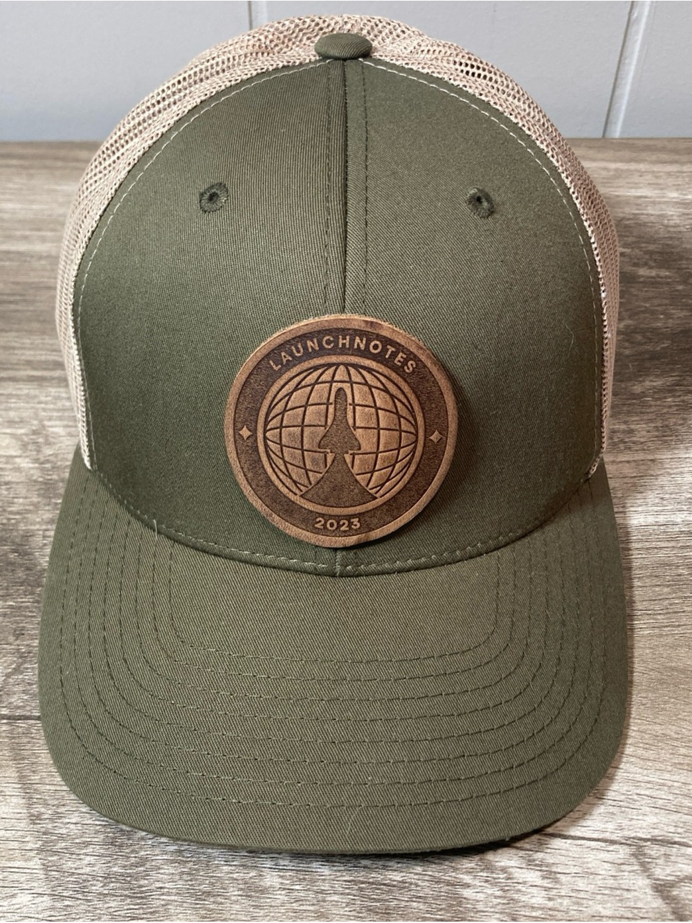 The Classics Yupoong Tan & Olive Launchnotes 2023 Trucker Cap SnapBack OS